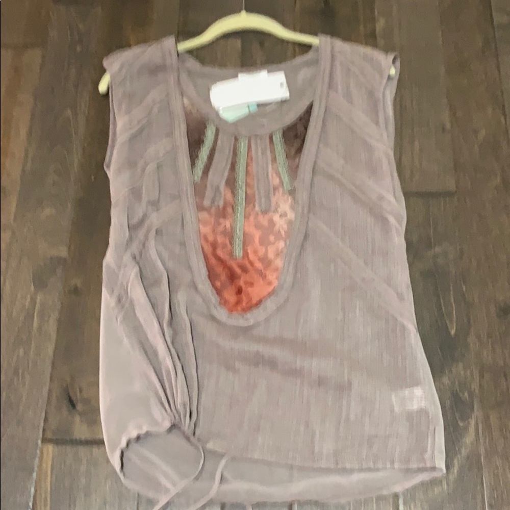 Beautiful blouse with Waste tie.    Stunning